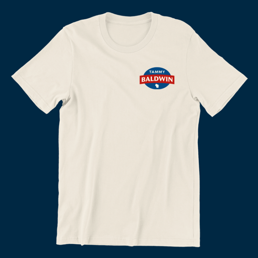 Cream-colored short-sleeved t-shirt in a unisex fit. There's a smaller Tammy Baldwin for Senate logo on the left breast pocket.